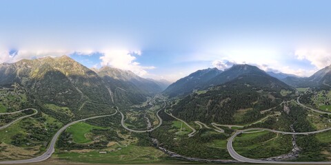 Fototapeta na wymiar Aerial View of Swiss Mountain curvy highway between the mountains . Mesocco, Swizerland. 