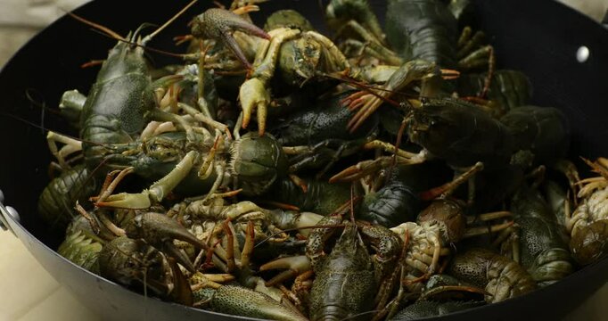 boiled crayfish on an iron plate.