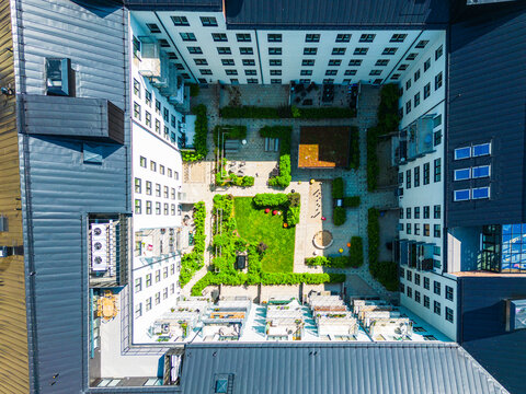 Aerial vie of courtyard surrounded by block of flats