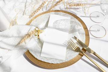 4x9 menu card mockup on white and gold plates and golden cutlery 