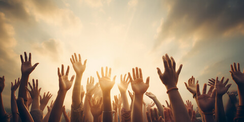 hands raised to the sky. 