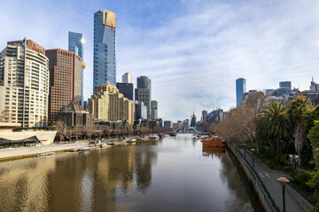 View from Princes Bridge on Yarra river in Melbourne city of south bank & pedestrian bridge.