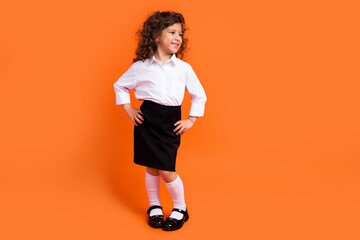 Photo of cute smart kid girl dressed new uniform prepared for first september school party isolated bright color background