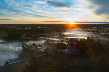 Beautiful sunrise on the Viru swamp in summer, photo from a drone.