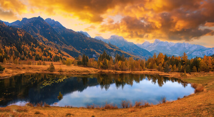 perfect fairytale landscape with a big lake in autumn and a beautiful sunset