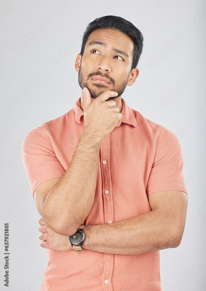 Poster face, thinking and asian man in studio for planning, decision or questions on grey background space.