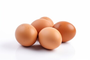 A stack of brown eggs