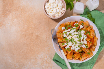 Rigatoni pasta with tomato sauce and cottage cheese