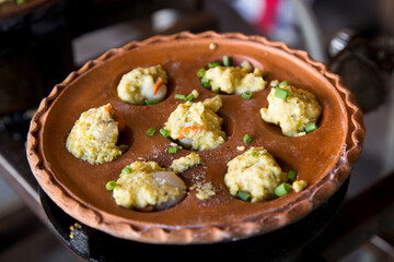 Pan Sip Nueng Sai Kai. Thai steamed dumplings with chicken peanut filling.