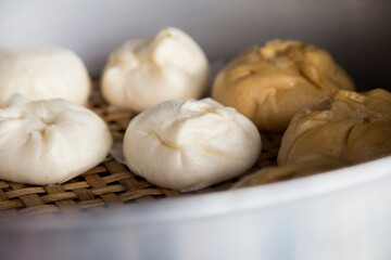 Fototapeta na wymiar Pan Sip Nueng Sai Kai. Thai steamed dumplings with chicken peanut filling.