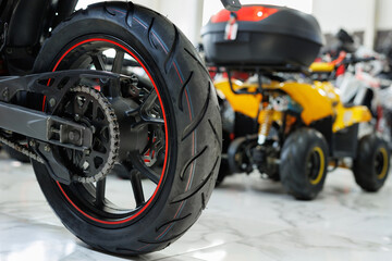 Elements of a modern motorcycle, ATV, in the showroom of the store close-up.