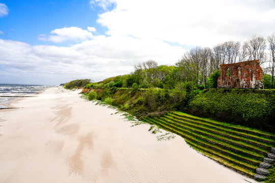 View of the church ruins of Hoff. Old ruin on the beach of the Polish Baltic Sea with the surrounding nature.
