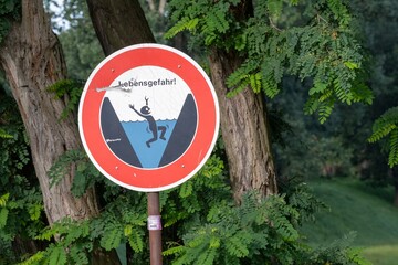 warning sign on a canal