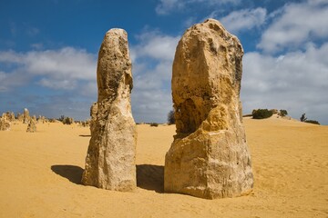 Two big limestone pillars in the Pinnacles Desert, Western Australia. Amazing and big pinnacles in...