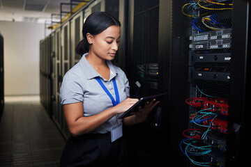 Woman, tablet and data center in inspection, programming and coding of power solution, cables check...