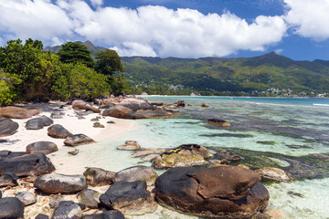 White sands and coastal stones of Beau Vallon beach, Seychelles