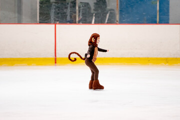 child skater in a monkey costume