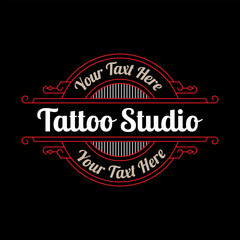 Fototapeta premium Vintage tattoo studio lettering logo with decorative ornamental frame. - Vector.