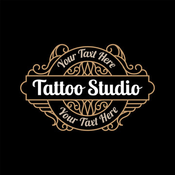 Vintage luxury tattoo studio lettering logo with decorative ornamental frame. - Vector.