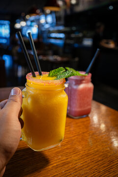 a couple of fruit smothie chearing