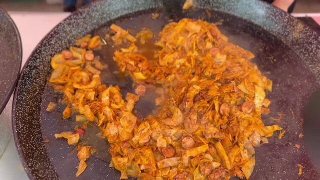 Cooking of bigos, a Polish hunter stew on the International street market that visited Ystad, Scania, Sweden, Scandinavia, Europe