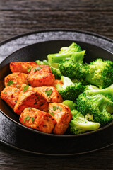 fried salmon bites with steamed broccoli florets