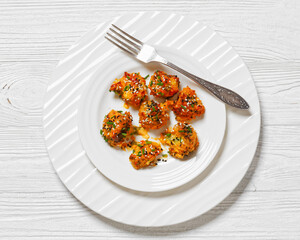 bang bang broccoli bites on plate, top view
