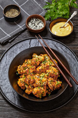 bang bang broccoli bites in bowl, top view