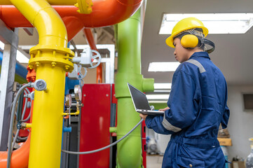 Maintenance technician at a heating plant,Petrochemical workers supervise the operation of gas and...