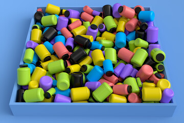 Pile of multicolor plastic jar for sport nutrition protein powder on blue