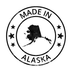 Made in Alaska grunge rubber stamp with state map isolated on transparent background