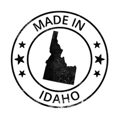 Made in Idaho grunge rubber stamp with state map isolated on transparent background