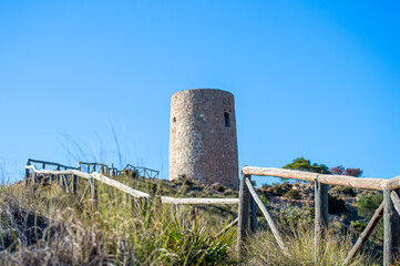 Mediterranean coastal landscape. Historic Torre Vigia De Cerro Gordo, a watchtower looking out for...