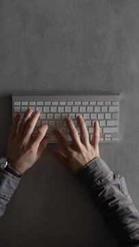 Businessman typing on a computer keyboard