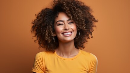a woman laughing emotionally against a colorful background