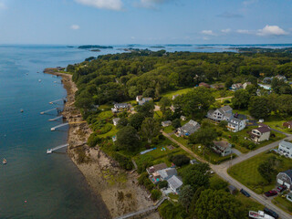 Fototapeta na wymiar Aerial view of a Harpswell water front neighborhood. Pictures taken with drone during the summer