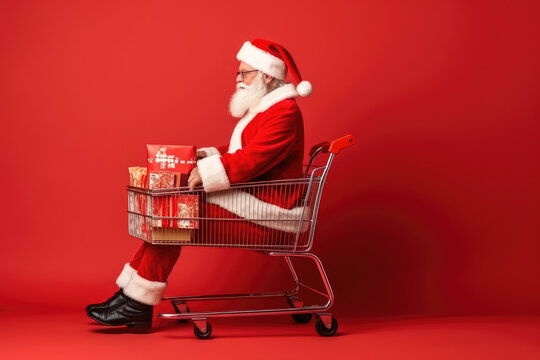real man Santa Claus near a shopping cart full of present box on a red background.  Generative AI.