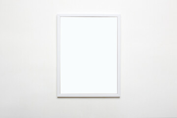 white picture frame on wall. Stylish modern photoframe