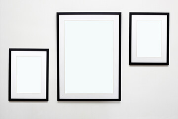 black picture frames. Stylish photoframes with passe-partout for poster or pictute. Gallery wall