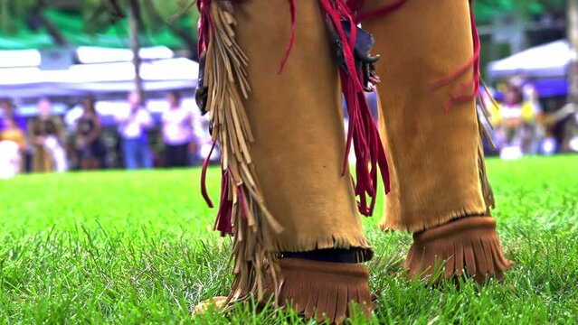 Close up from pow wow dancer legs  in slow motion