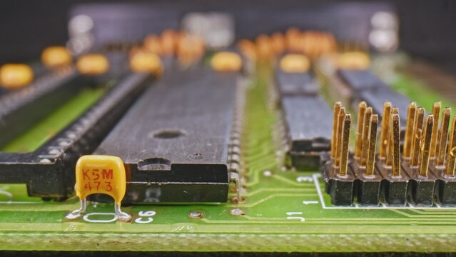 Complex Electronic Circuit Board with THT Components Resistor Capacitor Microcontroller EEPROM Memory Bank