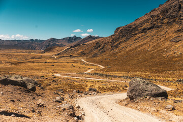 Remote dirt gravel road in the andes of Peru, 