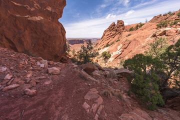 hiking the syncline loop trail in island in the sky district of canyonlands national park, utah, usa