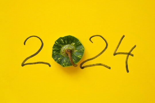 2024, where instead of zero on a yellow background there is a watermelon peel, New Year 2024