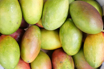 Fresh green mango on table top view 