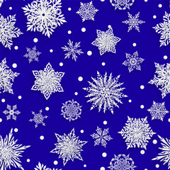 Christmas seamless pattern with beautiful complex paper snowflakes, white on blue background