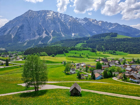 Summer austrian landscape with Grimming mountain (2.351 m), an isolated peak in the Dachstein Mountains, view from small alpine village Tauplitz, Styria, Austria