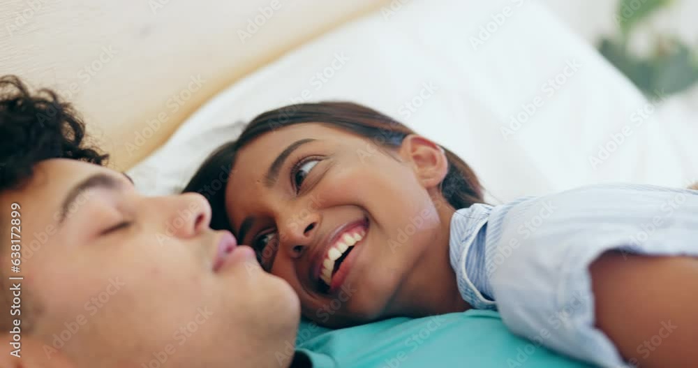 Canvas Prints Couple in bed, pillow talk and love with communication, relax together and happy, trust and support. Commitment, partner and healthy interracial relationship, woman and man, story and conversation