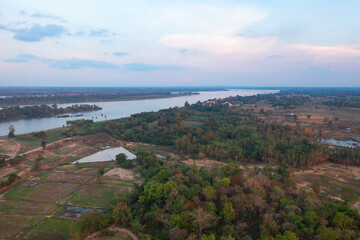 Aerial view of Mekong River with green mountain hill. Nature landscape background in Ubon Ratchathani, Thailand and Laos.