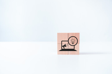 Creative marketing icon on wooden cube block. Creative marketing concept. Leveraging technology,...